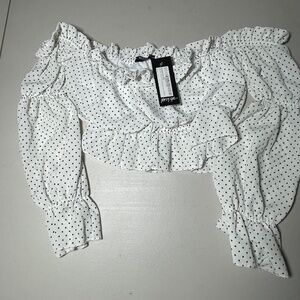 Nasty Gals Women’s Top. Off the shoulder. Flute sleeves. Ruffles. Made in Italy.